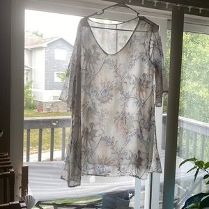Large white-floral tunic.